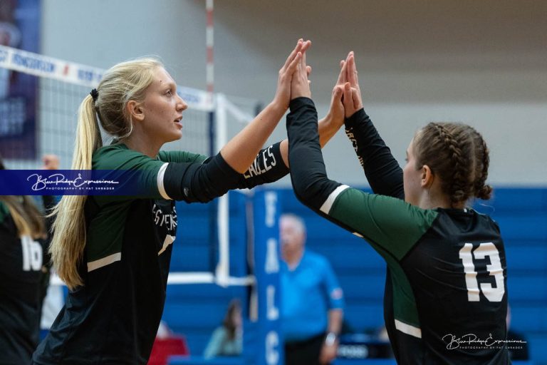 East v West Volleyball Action